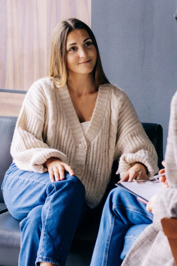 Olive-Counselling-Individual-Therapy-Counselling-Vancouver-BC Woman sitting and smiling in a counselling session